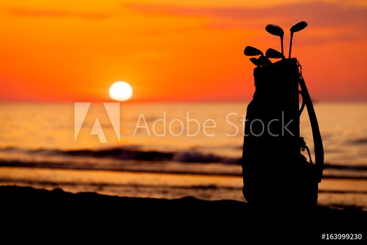 Bild på Idyllic shot of sunset and golf clubs